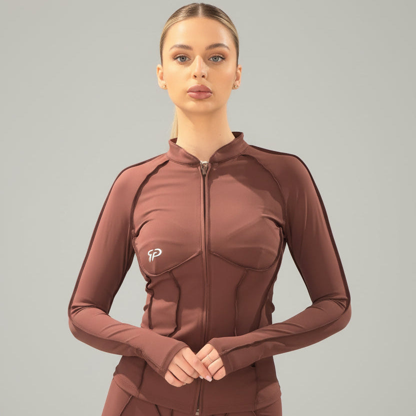Brown jacket on a mannequin with a blurred background